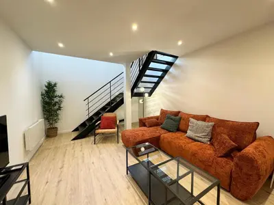 Coin salon dans l'établissement Appartement Cosy en Centre-Ville