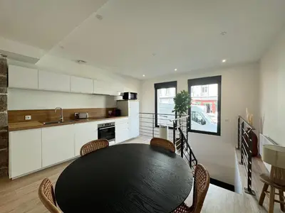 Cuisine ou kitchenette dans l'établissement Appartement Cosy en Centre-Ville