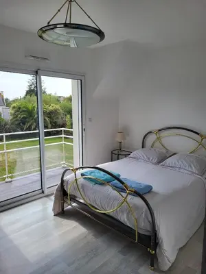 Un ou plusieurs lits dans un hébergement de l'établissement VILLA FAMILIALE Bord de Mer