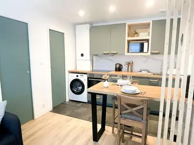 Cuisine ou kitchenette dans l'établissement Studio cosy