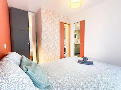 Un ou plusieurs lits dans un hébergement de l'établissement Studio cosy