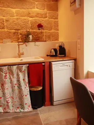 Cuisine ou kitchenette dans l'établissement Gîte de LEIGNOUA