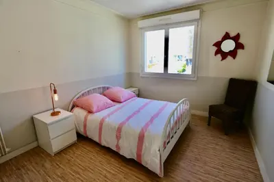 Un ou plusieurs lits dans un hébergement de l'établissement Joli appartement Centre-ville