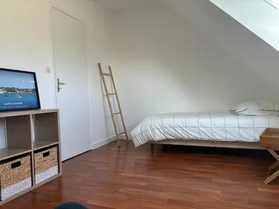 Un ou plusieurs lits dans un hébergement de l'établissement La maison des dunes de Kerambigorn