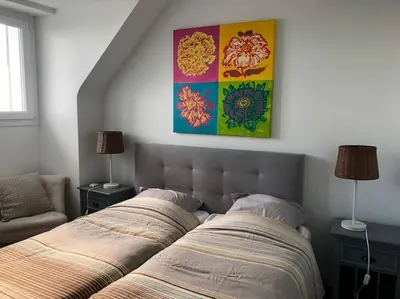 Un ou plusieurs lits dans un hébergement de l'établissement Superbe maison face a l ocean