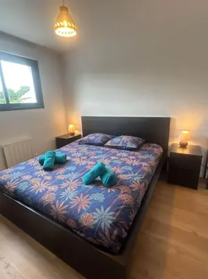 Un ou plusieurs lits dans un hébergement de l'établissement Chez Katerina - Plomeur proches plages