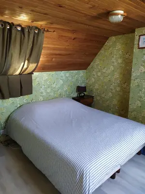 Un ou plusieurs lits dans un hébergement de l'établissement Maison de vacances à Portsall