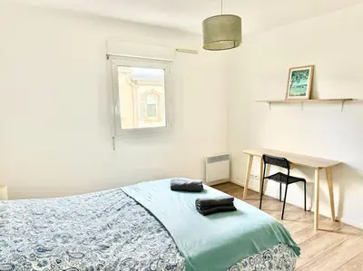 Un ou plusieurs lits dans un hébergement de l'établissement Appartement deux chambres Brest centre proche Tram