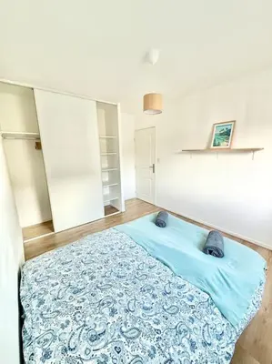 Un ou plusieurs lits dans un hébergement de l'établissement Appartement deux chambres Brest centre proche Tram