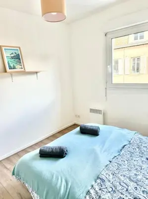 Un ou plusieurs lits dans un hébergement de l'établissement Appartement deux chambres Brest centre proche Tram