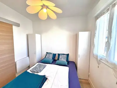 Un ou plusieurs lits dans un hébergement de l'établissement Maison lumineuse à LOCTUDY