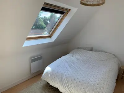 Un ou plusieurs lits dans un hébergement de l'établissement Jolie maison de vacances