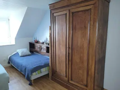 Un ou plusieurs lits dans un hébergement de l'établissement Locquenole - maison avec vue mer