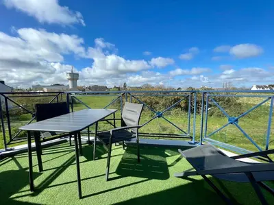 Balcon ou terrasse dans l'établissement Bel appartement exposé Sud-ouest avec terrasse