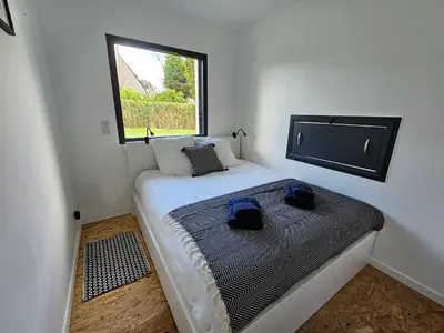 Un ou plusieurs lits dans un hébergement de l'établissement Maison d'architecte 9p - 400m de la mer & du bourg