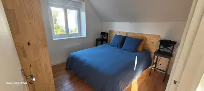 Un ou plusieurs lits dans un hébergement de l'établissement maison cosy