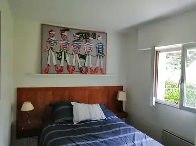 Un ou plusieurs lits dans un hébergement de l'établissement Maison au calme proche de la mer Fouesnant Cap Coz