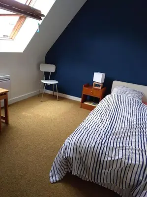 Un ou plusieurs lits dans un hébergement de l'établissement Maison au calme proche de la mer Fouesnant Cap Coz