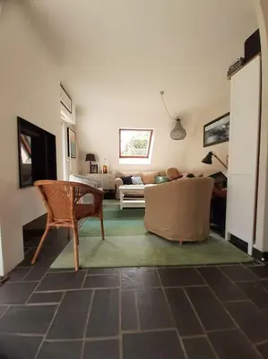 Coin salon dans l'établissement Maison au calme proche de la mer Fouesnant Cap Coz