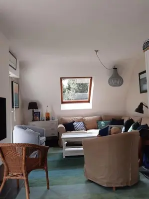Coin salon dans l'établissement Maison au calme proche de la mer Fouesnant Cap Coz