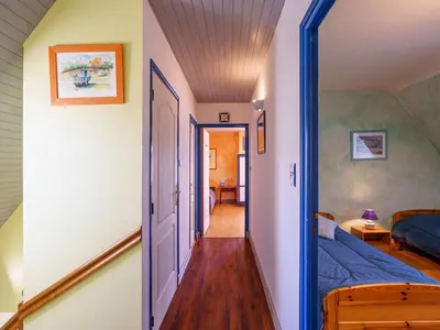 Un ou plusieurs lits dans un hébergement de l'établissement Holiday Home La mouette bleue by Interhome