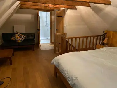 Un ou plusieurs lits dans un hébergement de l'établissement Garden Cottage Kervolongar