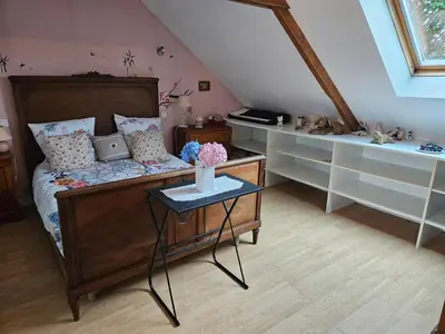 Un ou plusieurs lits dans un hébergement de l'établissement Chambre d'hôte à coté de la voie verte