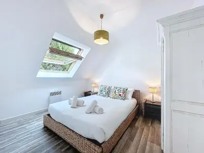 Un ou plusieurs lits dans un hébergement de l'établissement Ker Lodan jolie maison 3 chambres et terrasse