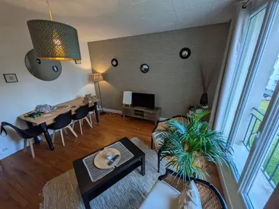Coin salon dans l'établissement Grand Appartement lumineux