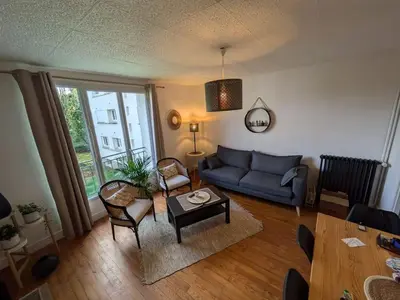 Coin salon dans l'établissement Grand Appartement lumineux