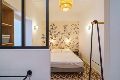 Un ou plusieurs lits dans un hébergement de l'établissement Studio Meneyer - À 100m de la plage Bénodet