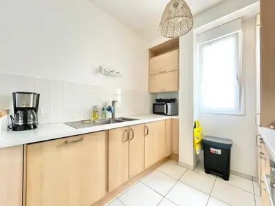 Cuisine ou kitchenette dans l'établissement Benodet Centre 200m de la plage