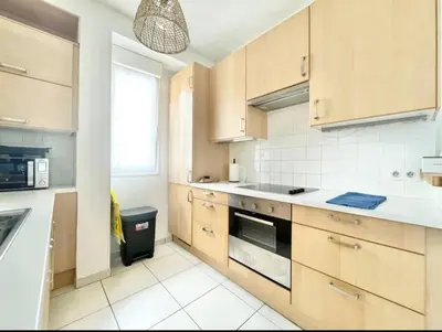 Cuisine ou kitchenette dans l'établissement Benodet Centre 200m de la plage