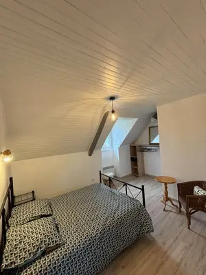 Un ou plusieurs lits dans un hébergement de l'établissement Gîte de Pennenez