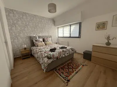 Un ou plusieurs lits dans un hébergement de l'établissement Appartement les Capucins ROSCOFF