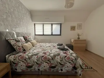 Un ou plusieurs lits dans un hébergement de l'établissement Appartement les Capucins ROSCOFF