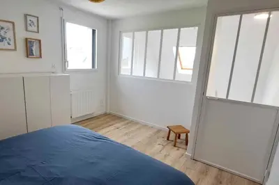 Un ou plusieurs lits dans un hébergement de l'établissement Petite maison de bord de mer