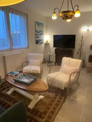 Coin salon dans l'établissement Le jardin des dunes