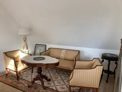Coin salon dans l'établissement Le jardin des dunes