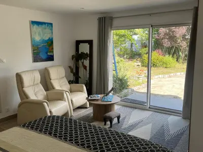 Coin salon dans l'établissement Le jardin des dunes