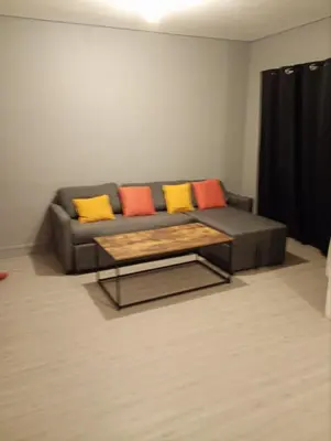 Coin salon dans l'établissement Appartement avec 2 chambres Morlaix et internet