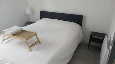Un ou plusieurs lits dans un hébergement de l'établissement Appartement avec 2 chambres Morlaix et internet