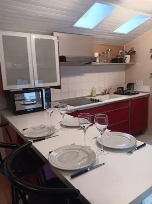 Cuisine ou kitchenette dans l'établissement Le Penty
