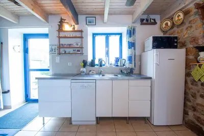 Cuisine ou kitchenette dans l'établissement Le Gaoulac'H I Vue mer & Grand jardin