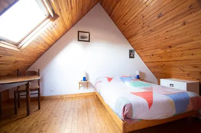 Un ou plusieurs lits dans un hébergement de l'établissement Le Gaoulac'H I Vue mer & Grand jardin