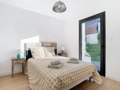 Un ou plusieurs lits dans un hébergement de l'établissement Maison La Caravelle à Crozon