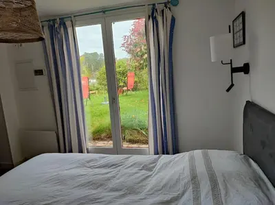 Un ou plusieurs lits dans un hébergement de l'établissement maison 4 personnes face à la mer