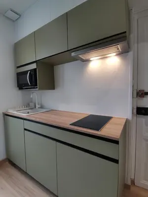 Cuisine ou kitchenette dans l'établissement Studio cosy et calme