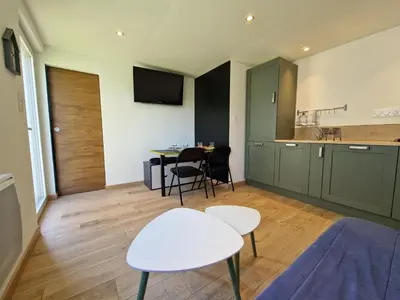 Cuisine ou kitchenette dans l'établissement La Maisonette