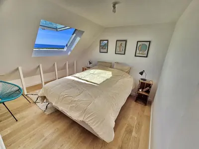 Un ou plusieurs lits dans un hébergement de l'établissement 727-Superbe vue mer, grand confort, les pieds dan